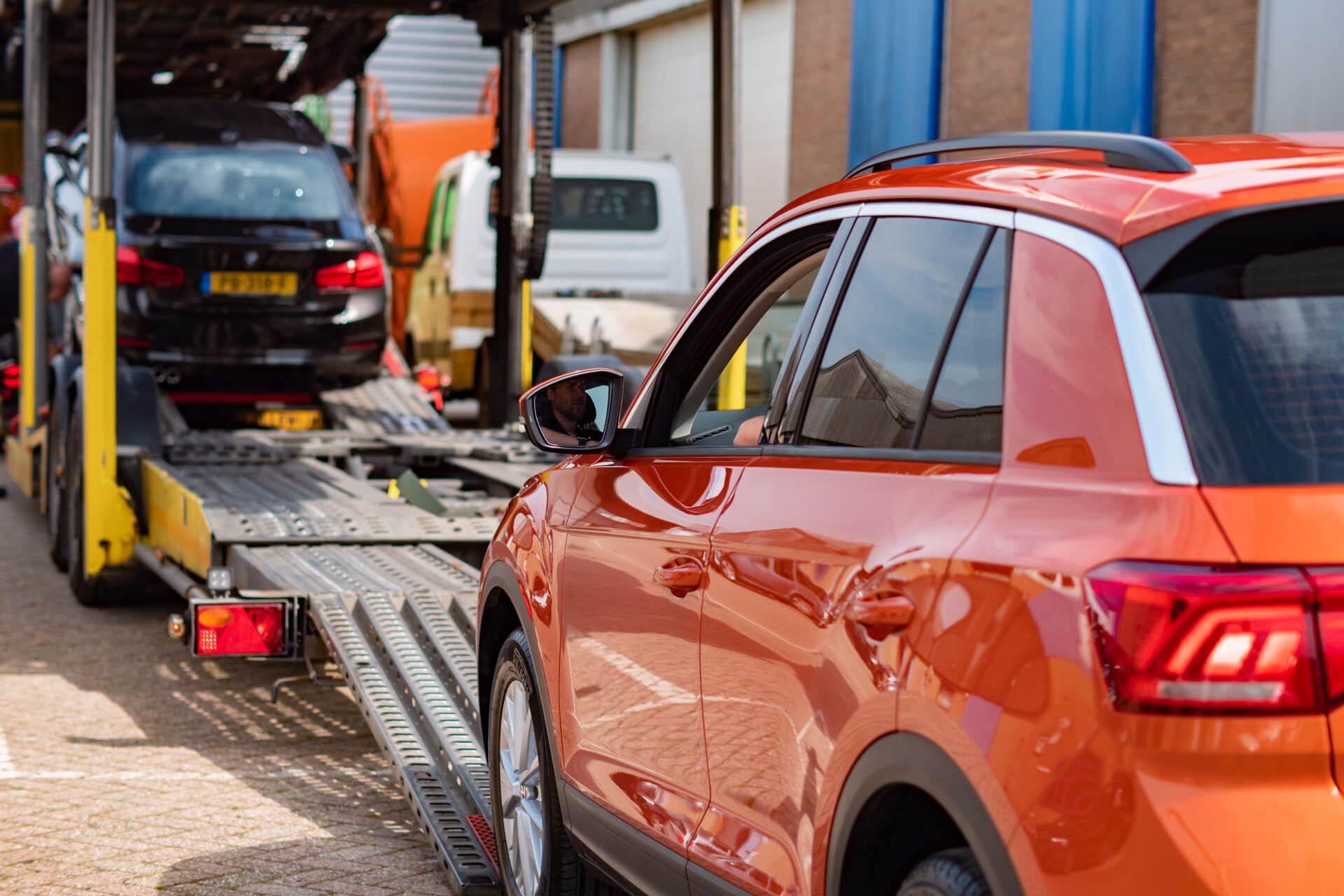 Kan een auto getransporteerd worden voor een proefrit?